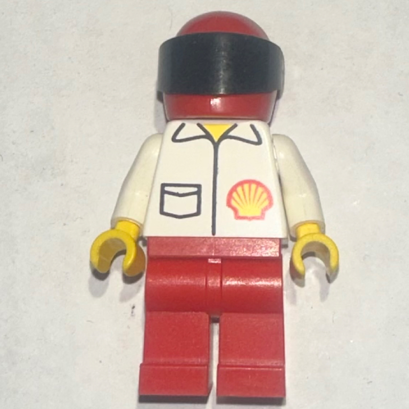 Pilote de course, chemise blanche avec logo Shell, jambes rouges, casque rouge avec visière (Racer, White Shirt with Shell Logo, Red Legs, Red Helmet with Visor)