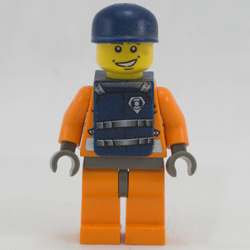 Garde-côte, combinaison orange avec fermeture éclair, radio et badge, casquette bleu foncé, gilet bleu foncé (Coast Guard, Orange Jumpsuit with Zipper, Radio, and Badge, Dark Blue Cap, Dark Blue Vest)