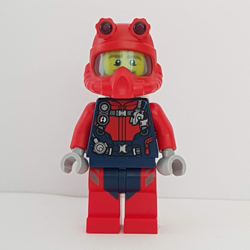 Plongeur, homme, combinaison rouge et bleu foncé avec sangles et jauges, casque de plongée rouge, bouteilles d’air, barbe (Diver, Man, Red and Dark Blue Wetsuit with Straps and Gauges, Red Diving Helmet, Airtanks, Beard)