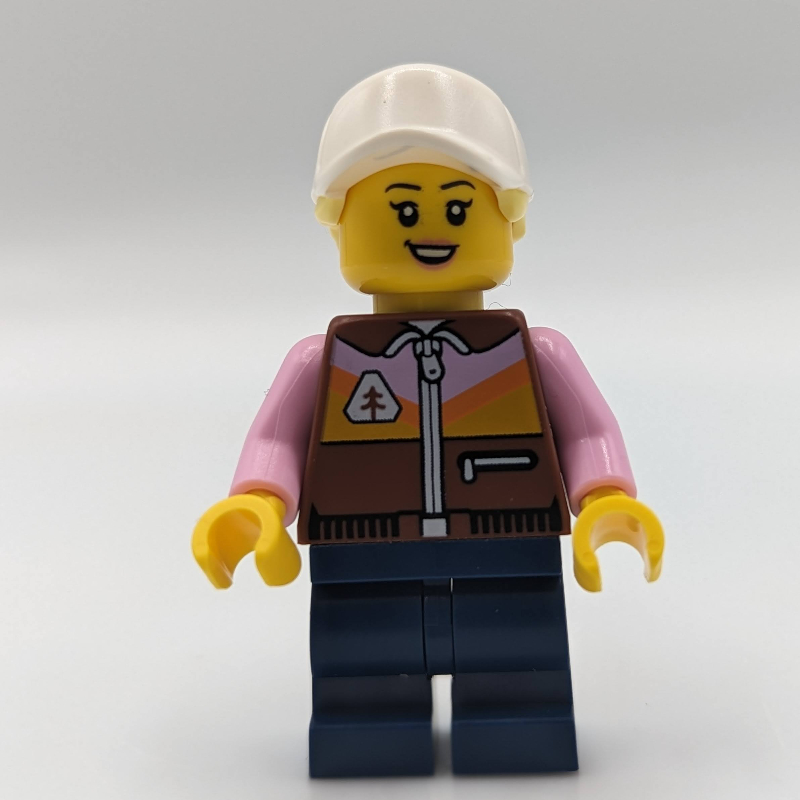 Dirt bike rider, femelle - gilet brun rougeâtre, jambes bleu foncé, casquette blanche avec queue de cheval (Dirt Bike Rider, Female - Reddish Brown Vest, Dark Blue Legs, White Cap with Ponytail)