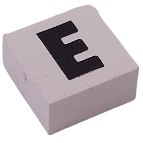 Visuel indicatif Rebrickable de Modulex tuile 2 x 2 avec motif imprimé noir 'E', doublure intérieure noire, point blanc (Modulex Tile 2 x 2 with Black 'E' Print, Black Internal Lining, White Dot)