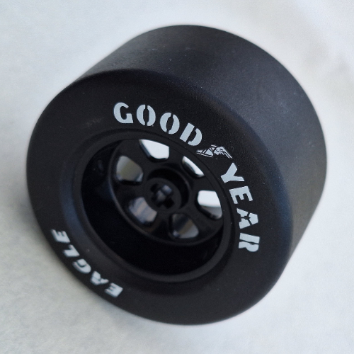 Visuel indicatif Rebrickable de Jante de roue 50 x 30 largeur avec pneu slick noir avec motif imprimé 'EAGLE', 'GOOD YEAR' (Wheel Rim 50 x 30 Wide with Black Slick Tyre with 'EAGLE', 'GOOD YEAR' Print)