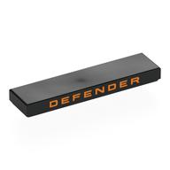 Visuel indicatif Rebrickable de Tuile 1 x 4 avec motif imprimé orange 'DEFENDER' sur le côté (Tile 1 x 4 with Orange 'DEFENDER' on Side Print)