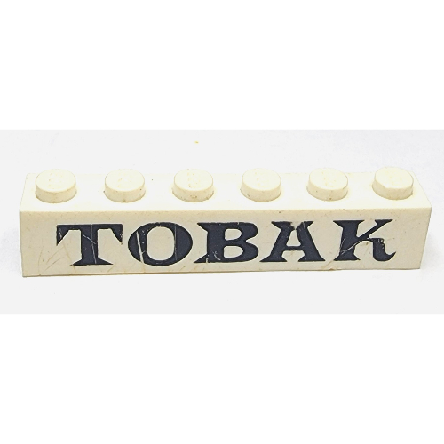 Visuel indicatif Rebrickable de Brique 1 x 6 avec motif imprimé noir serif 'TOBAK' (Brick 1 x 6 with 'TOBAK' Serif Black Print)