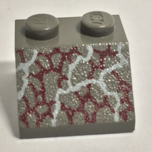 Visuel indicatif Rebrickable de Brique inclinée 45° 2 x 2 avec écailles de dinosaure motif imprimé (Brick Sloped 45° 2 x 2 with Dinosaur Scales Print)