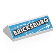 Visuel indicatif Rebrickable de Brique inclinée 45° 2 x 4 double avec blanc 'welcome to BRICKSBURG' sur fond moyen azur motif imprimé (Brick Sloped 45° 2 x 4 Double with White 'welcome to BRICKSBURG' on Medium Azure Background Print)