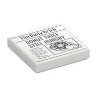 Visuel indicatif Rebrickable de Tuile 2 x 2 avec journal avec motif imprimé 'The Daily Brick' et 'DONUT THIEF STILL HUNGRY' (Tile 2 x 2 with Newspaper with 'The Daily Brick' and 'DONUT THIEF STILL HUNGRY' Print)
