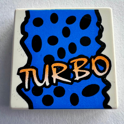 Visuel indicatif Rebrickable de Tuile 2 x 2 avec motif imprimé jaune 'TURBO', taches noires, fond bleu (Tile 2 x 2 with Yellow 'TURBO', Black Spots, Blue Background Print)