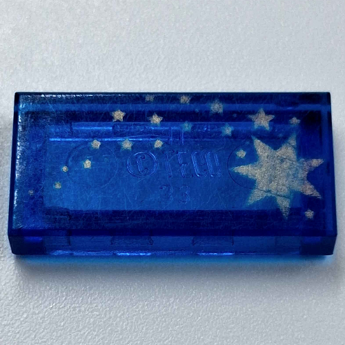 Visuel indicatif Rebrickable de Tuile 1 x 2 avec motif imprimé étoiles d'or (Tile 1 x 2 with Gold Stars Print)