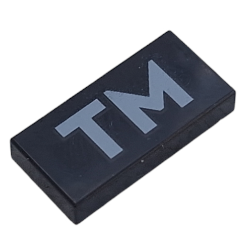 Visuel indicatif Rebrickable de Tuile 1 x 2 avec motif imprimé Argent 'TM' (Tile 1 x 2 with Silver 'TM' Print)