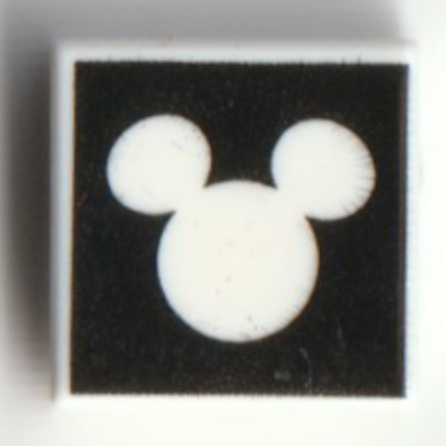 Visuel indicatif Rebrickable de Tuile 1 x 1 avec contour de souris mickey blanc, fond noir motif imprimé (Tile 1 x 1 with White Mickey Mouse Outline, Black Background Print)