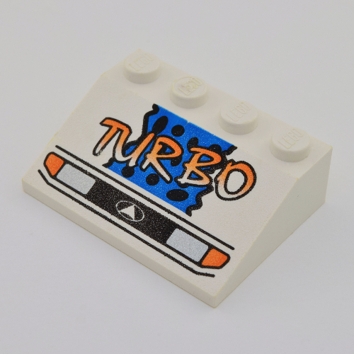 Visuel indicatif Rebrickable de Brique inclinée 33° 3 x 4 avec Phares, jaune 'TURBO', fond bleu et motif imprimé Taches noires (Brick Sloped 33° 3 x 4 with Headlights, Yellow 'TURBO', Blue Background and Black Spots Print)