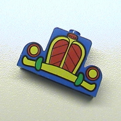 Visuel indicatif Rebrickable de Brique incurvée 1 x 4 x 2 centre stud haut avec motif imprimé de voiture de souris jaune et rouge (Brick Curved 1 x 4 x 2 Centre Stud Top with Yellow and Red Mickey Mouse Car Grill Print)