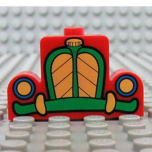 Visuel indicatif Rebrickable de Brique incurvée 1 x 4 x 2 centre stud haut avec motif imprimé de voiture de souris jaune et vert (Brick Curved 1 x 4 x 2 Centre Stud Top with Yellow and Green Mickey Mouse Car Grill Print)