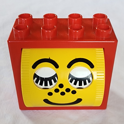 Visuel indicatif Rebrickable de Duplo brique 2 x 4 x 2 avec visage avec des taches de rousseur en tambour rotatif jaune (Duplo Brick 2 x 4 x 2 with Face with Freckles in Yellow Rotating Drum)